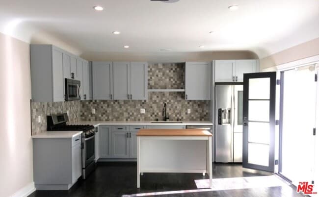 Building Photo - 1180 S Tremaine Ave