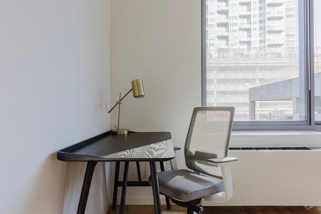 Building Photo - 4-75-75 48th Ave