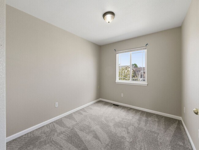 Building Photo - Recently Refreshed 3 Bed, 2.5 Bath Duplex with Fenced Yard — Available Now in Evans, CO!