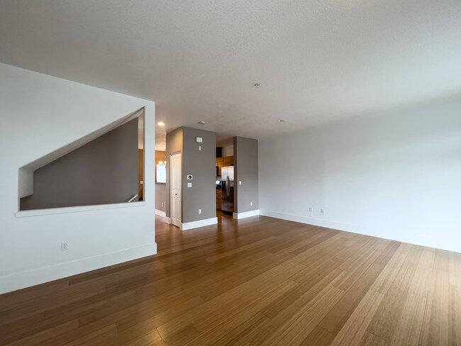Building Photo - Enjoy this 3 Bedroom 2.5 Bathroom End Townhome ~ 2 Car Garage + Washer & Dryer! Great Cedar Mill ...