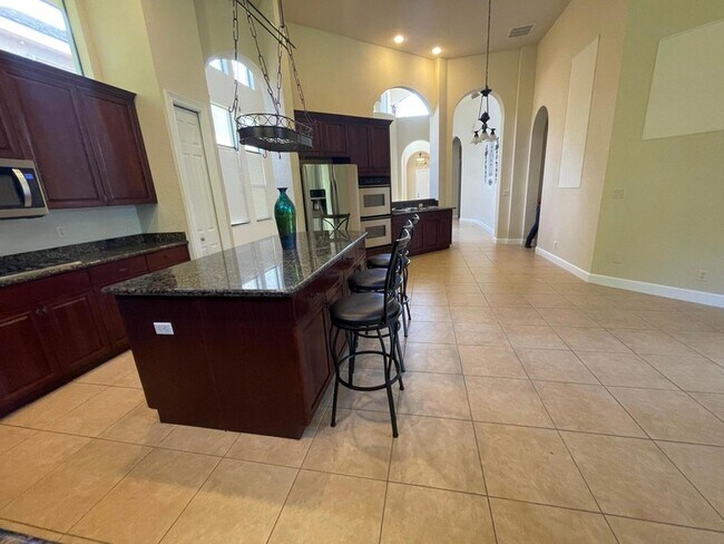 Building Photo - 10341 Medicis Pl