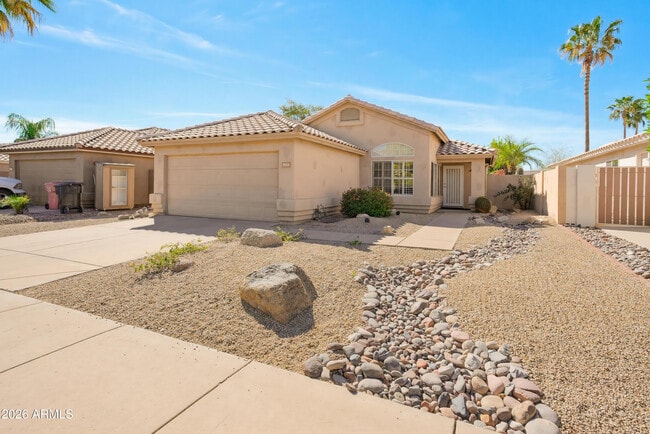 Building Photo - 9321 E Caribbean Ln