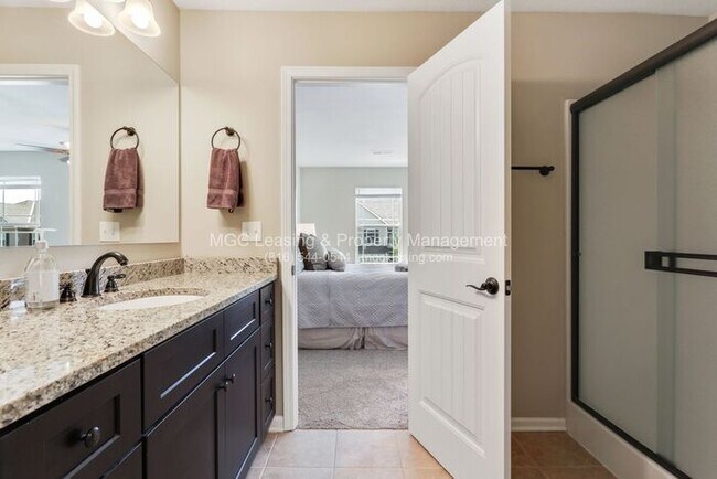 Building Photo - Beautiful Serrano Townhome with FULLY FINISHED Walk-out Basement