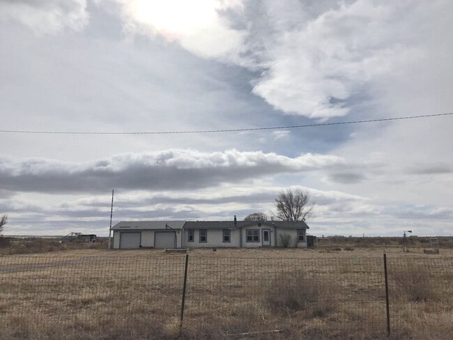 Building Photo - 4 bedroom home in Moriarty. Country Living! Close to I-40.