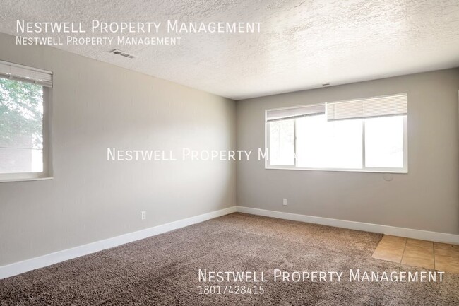 Building Photo - FREE 1ST MONTH'S RENT - Remodeled 2-bed Un...