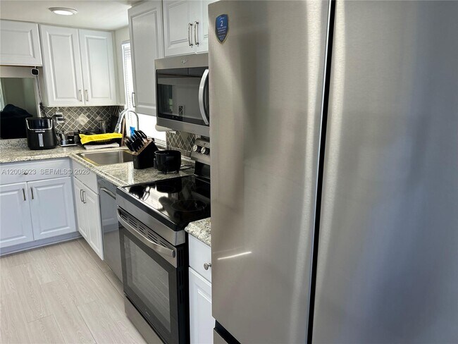 Building Photo - 8310 Sands Point Blvd