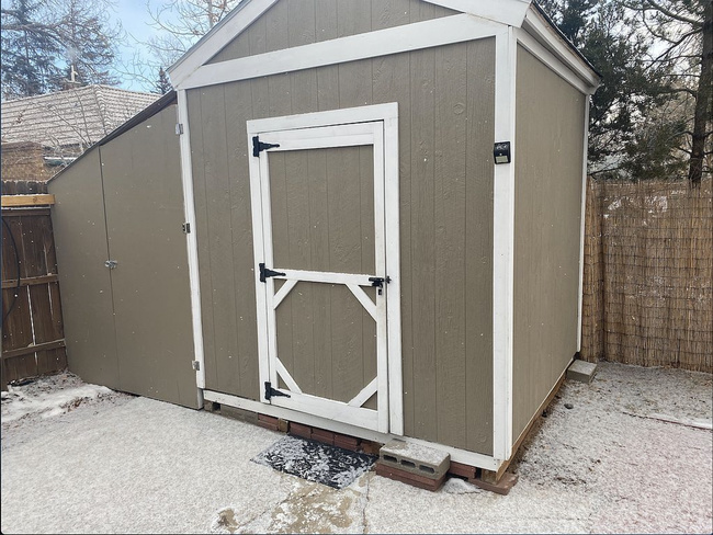 Included storage shed with auxiliary refuse storage. - 711 S 11th St