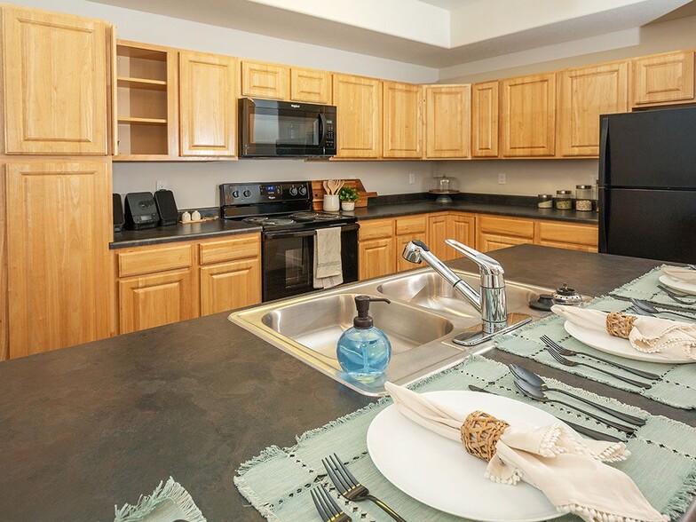 Kitchen and Island - Four Seasons at Southtowne Apartments