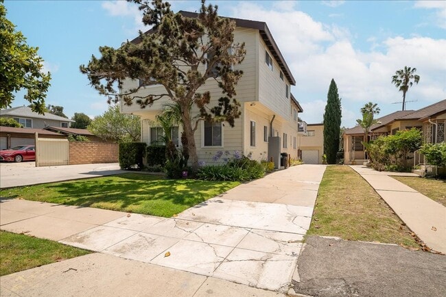 Building Photo - 7100-7104 1/2 Kittyhawk Ave. 1/2-7102