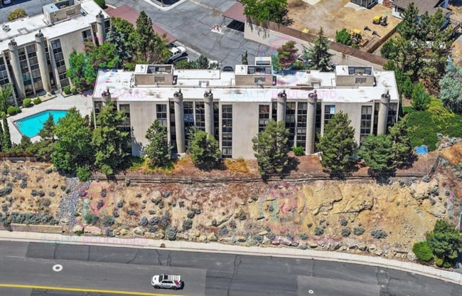 Building Photo - Incredible condo near UNR! This charming 2...