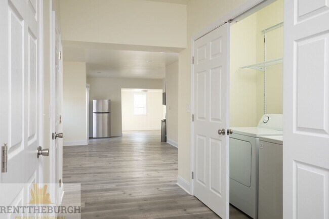 Building Photo - Updated 4BR House with 2 full baths and yard!