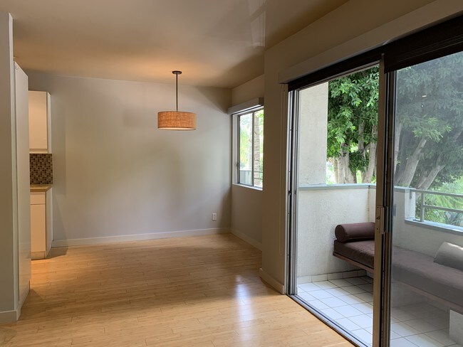 Main Living/Dining Areas & Balcony - 1250 N Kings Rd