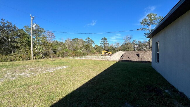 Building Photo - Beautiful 3 Bedroom Palm Bay Home with Upgrades & No Water Bill!