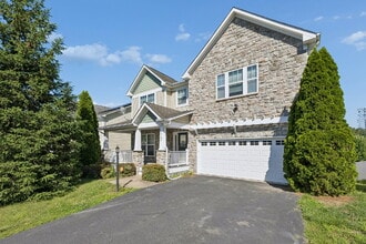 Building Photo - Beautiful and spacious stone-front colonial in sought-after Garrison Woods!