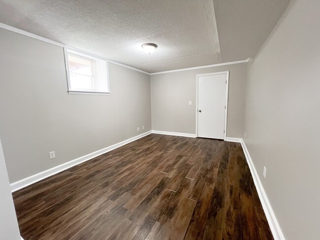 Building Photo - Split Foyer with a Fenced Backyard and a S...