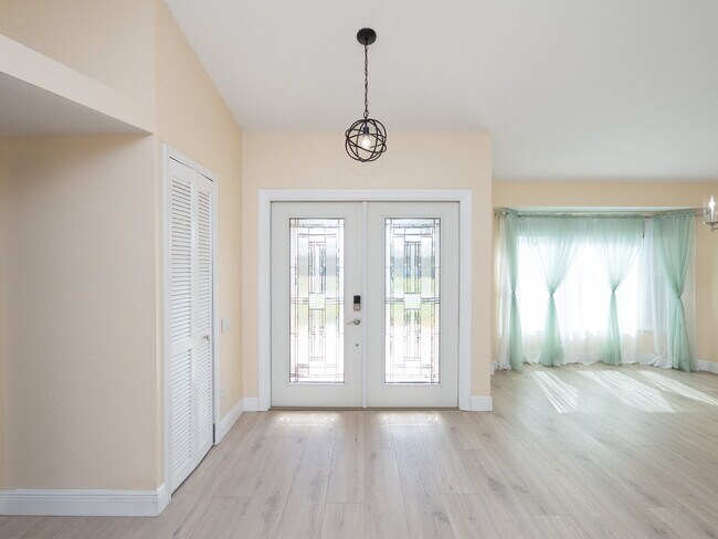 Building Photo - 3 BEDROOM • 2 BATHROOM • PRIVATE POOL • WATERFRONT • BOAT LIFT • ZERO DEPOSIT MOVE-IN AVAILABLE