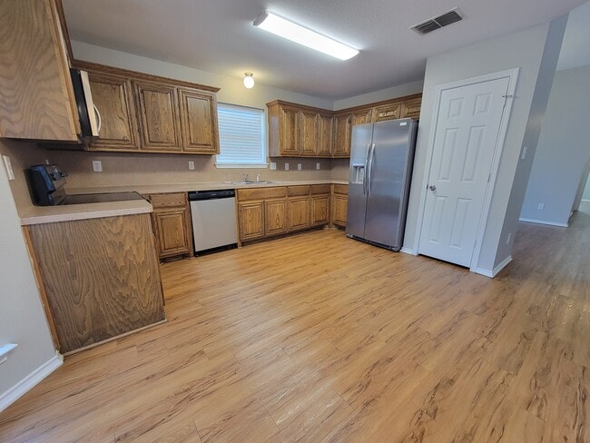 Building Photo - 6123 Flower Meadow