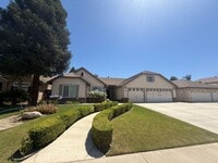 Building Photo - Beautiful 4 Bedroom, 3 Bathroom Home with Enclosed Patio & Stunning Backyard