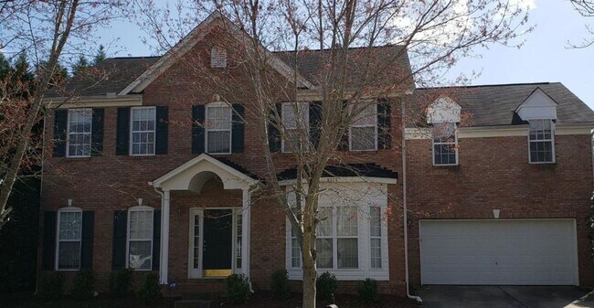 Building Photo - 4 BEDROOMS PLUS BONUS, BEAUTIFUL BACK PATI...