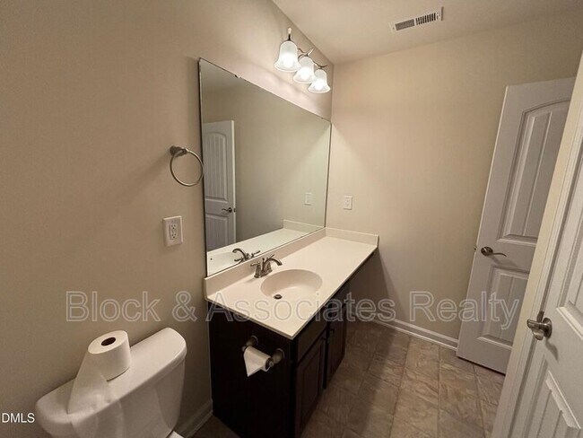 Building Photo - 1009 Magnolia Blossom Ln