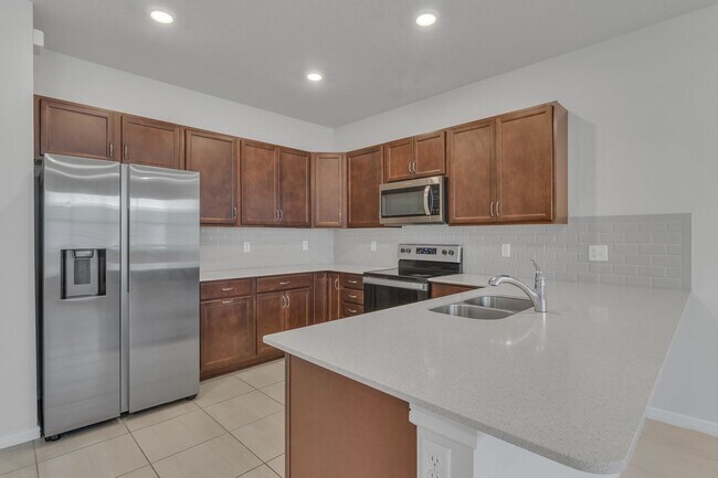 Building Photo - Luxurious Townhome in Lake Nona - A Perfec...