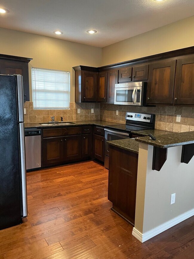 Building Photo - Beautiful all brick 4 bedroom home!