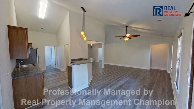 Building Photo - 3BD/2BA home w/vaulted ceilings, fireplace, 2-car garage, deck and fenced backyard