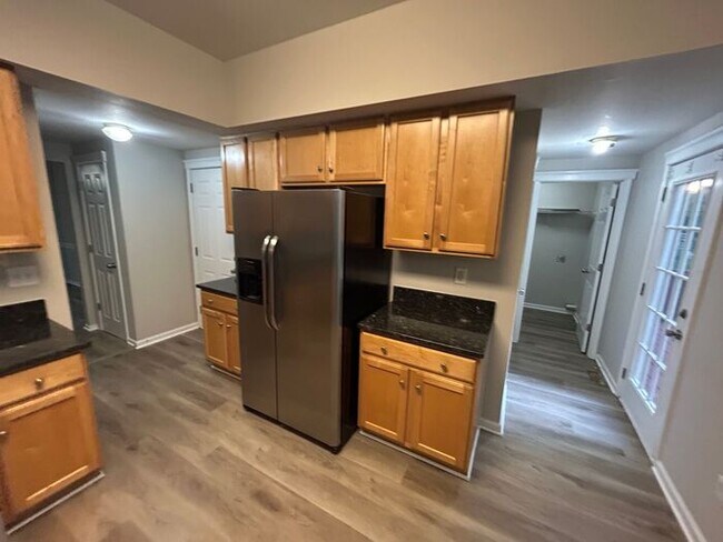 Building Photo - **Spacious 4-Bedroom Home with Walk-In Clo...