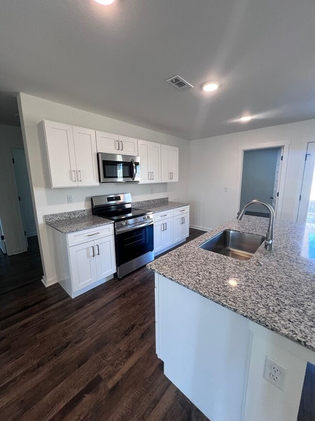 Building Photo - New Beginnings Start with AMRR: Now Pre Leasing with Move-In Special!