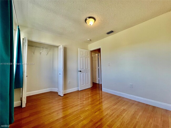 Building Photo - 3 br, 2.5 bath Condo - 8625 SW 152nd Ave A...