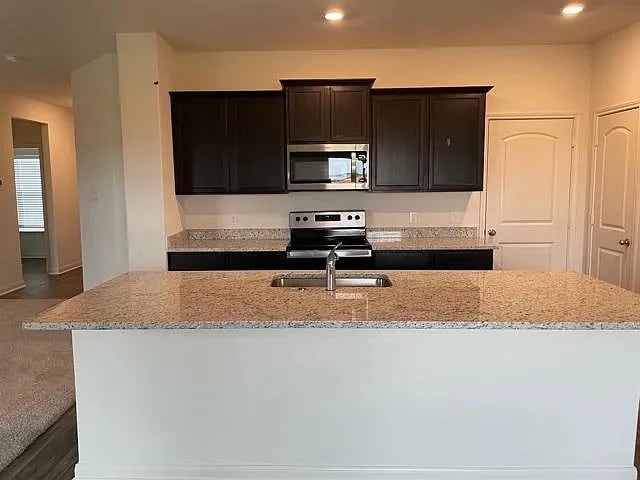 Building Photo - Beautifully Designed 4BR/2.5BA Home In The...