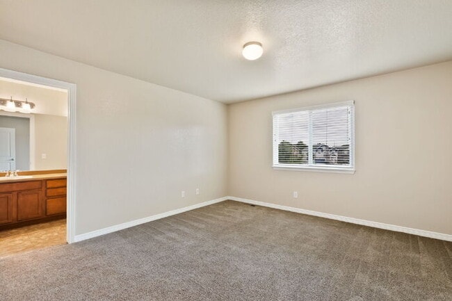 Building Photo - Spacious 3-Bedroom Home with Central A/C Near Fort Carson & Peterson