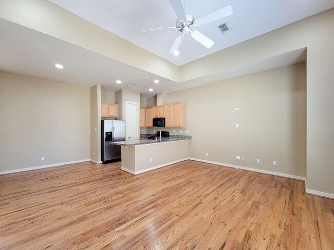 Building Photo - Elegant Gated Townhome Offering Unparallel...