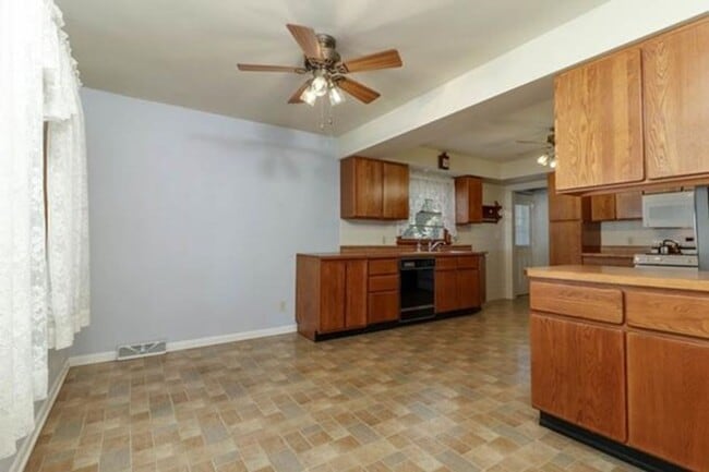 Building Photo - Spacious 3-Bedroom Home with Oversized Gar...