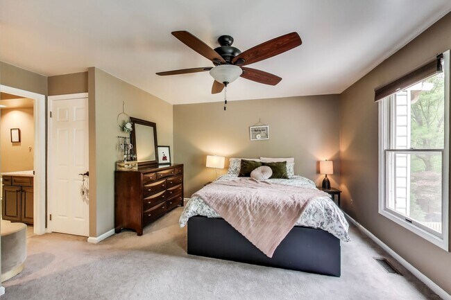 Building Photo - COMINGS SOON - Beautifully Updated Winchester-Built Townhome Backing to Serene Parkland.