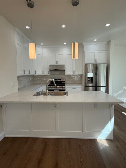 Building Photo - 8747 Ranchito Ave
