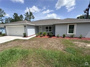 Building Photo - 1411 W Cary Dr