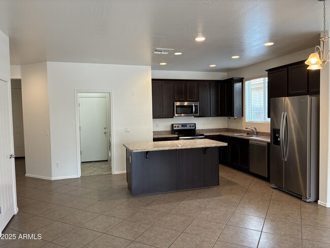 Building Photo - 11749 W Chase Ln