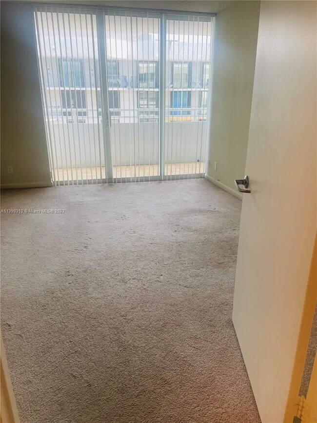 Building Photo - 8911 Collins Ave