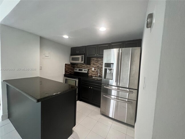Building Photo - 4301 NW S Tamiami Canal Dr