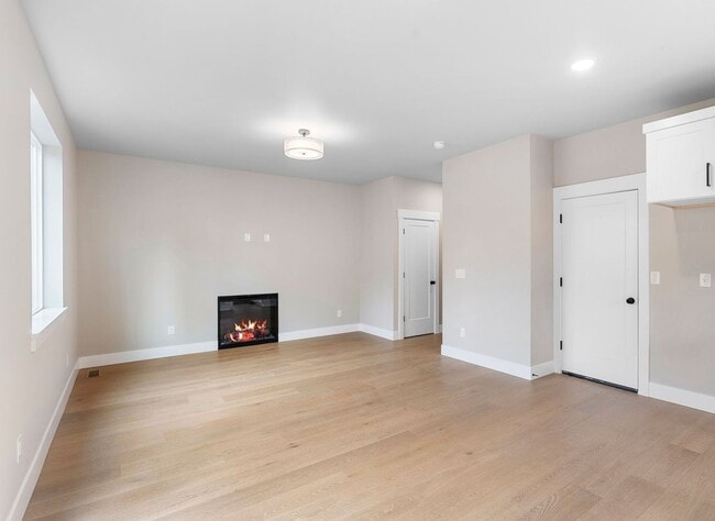 Building Photo - Brand-New 4-Bedroom Home Offering Modern Design, High-End Finishes, Attached Garage & Private Bac...