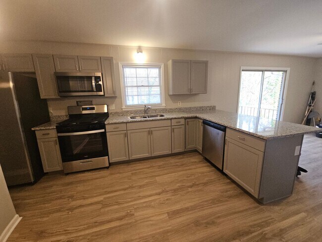 Building Photo - Renovated Classic - Upscale Brick Ranch on Basement