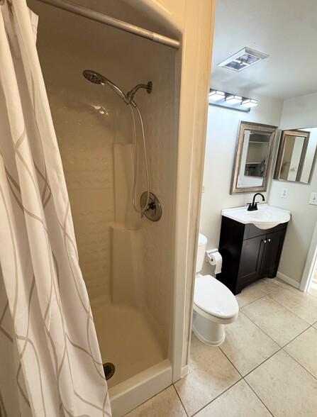 Main Floor Shower - 200 S Banana River Blvd