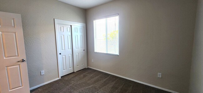 Building Photo - Freshly painted & all new carpeting - 3BR ...