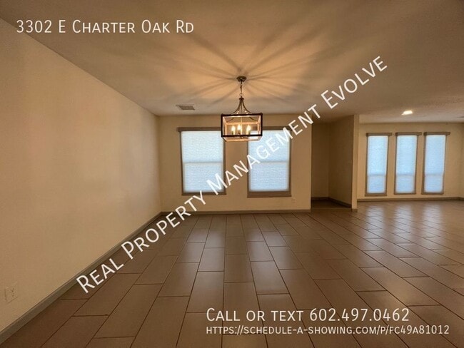 Building Photo - 3302 E Charter Oak Rd