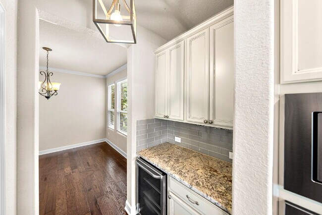 Building Photo - No Rear Neighbors, 3 Car Garage, a Chef's Kitchen, and Room for Everyone