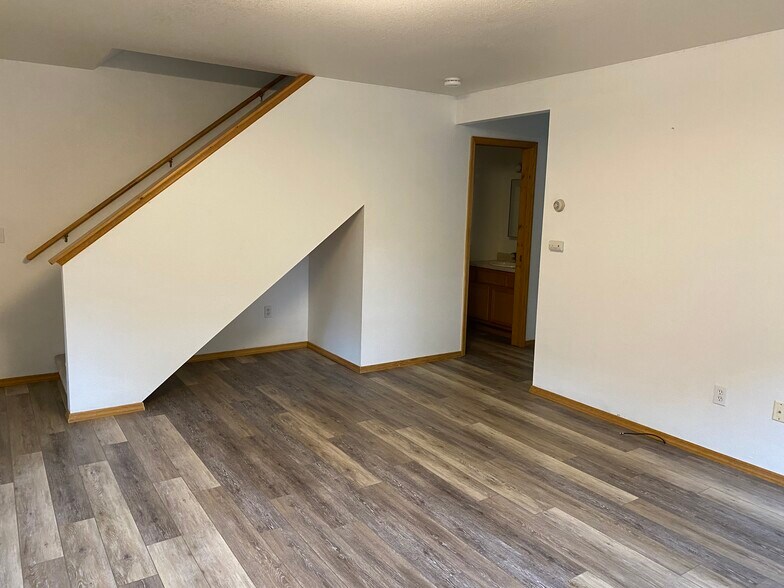 Living Room / Stairs - 414 W Babcock St, Unit 1