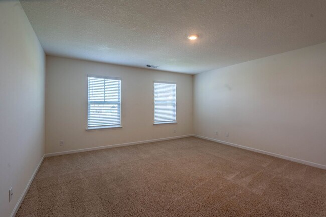 Building Photo - Newly built 3 bedroom and 2.5 bath home with garage.