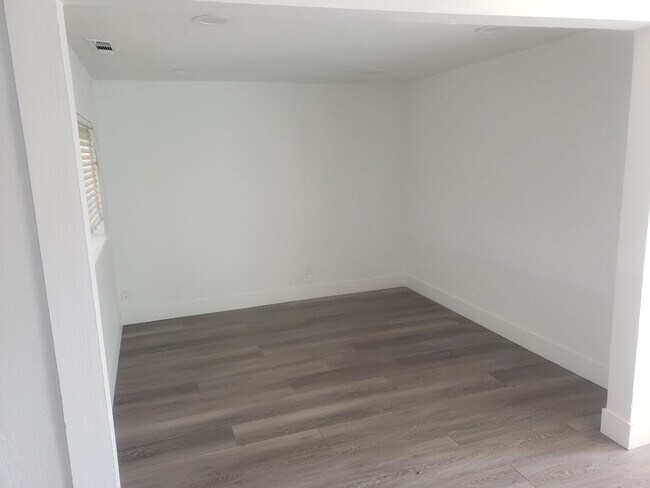 Building Photo - Beautifully Renovated Home with Updated Kitchen and bath, paint, and flooring! FREE SOLAR TOO!!!!