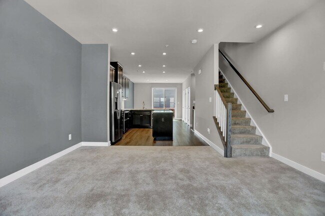 Building Photo - Luxury 4-Story Townhome with Rooftop Terrace!